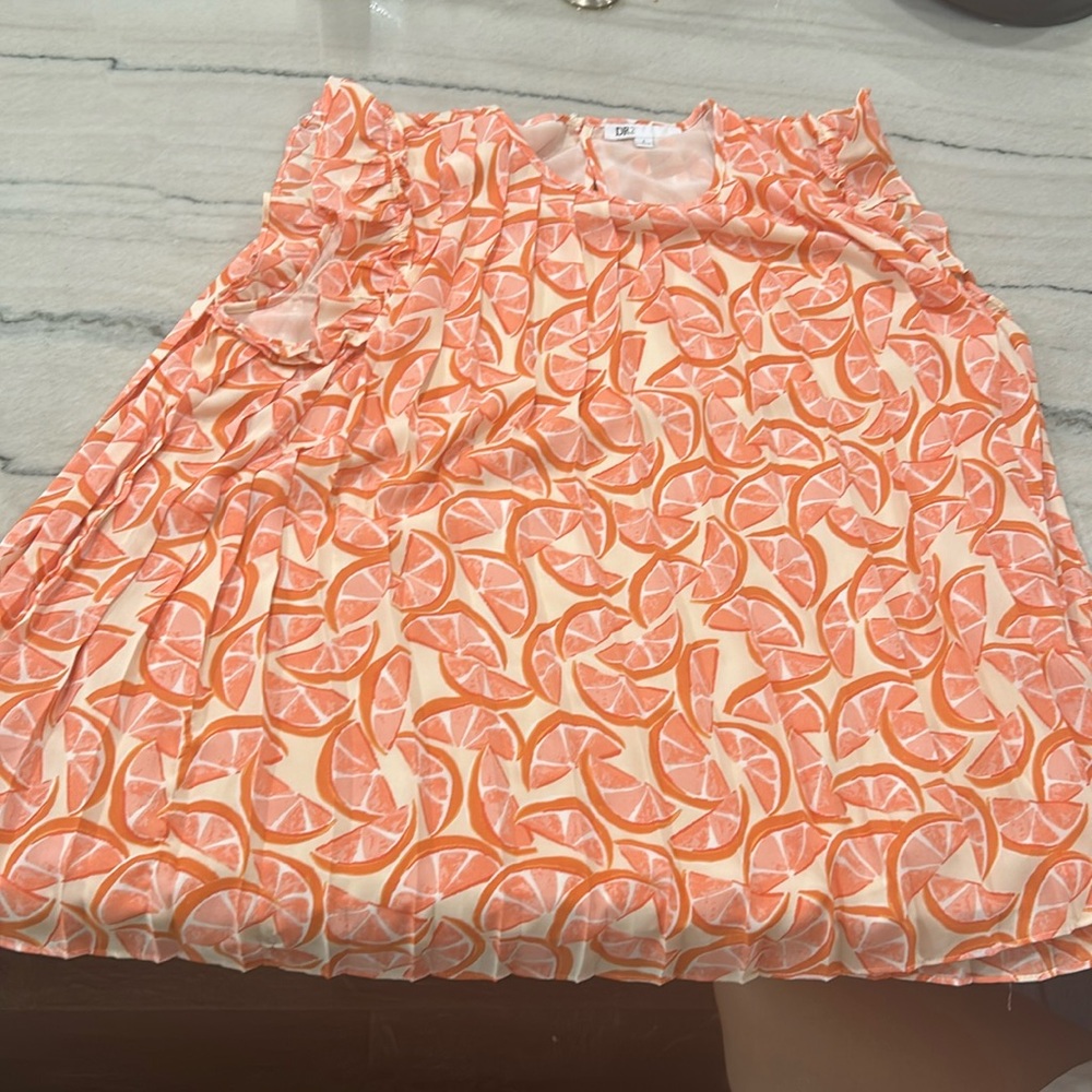 orange flowy shirt